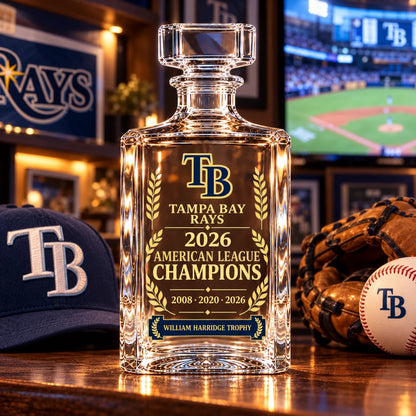 Rays 2026 AL Champions decanter in a fan cave with a TB cap, glove and baseball